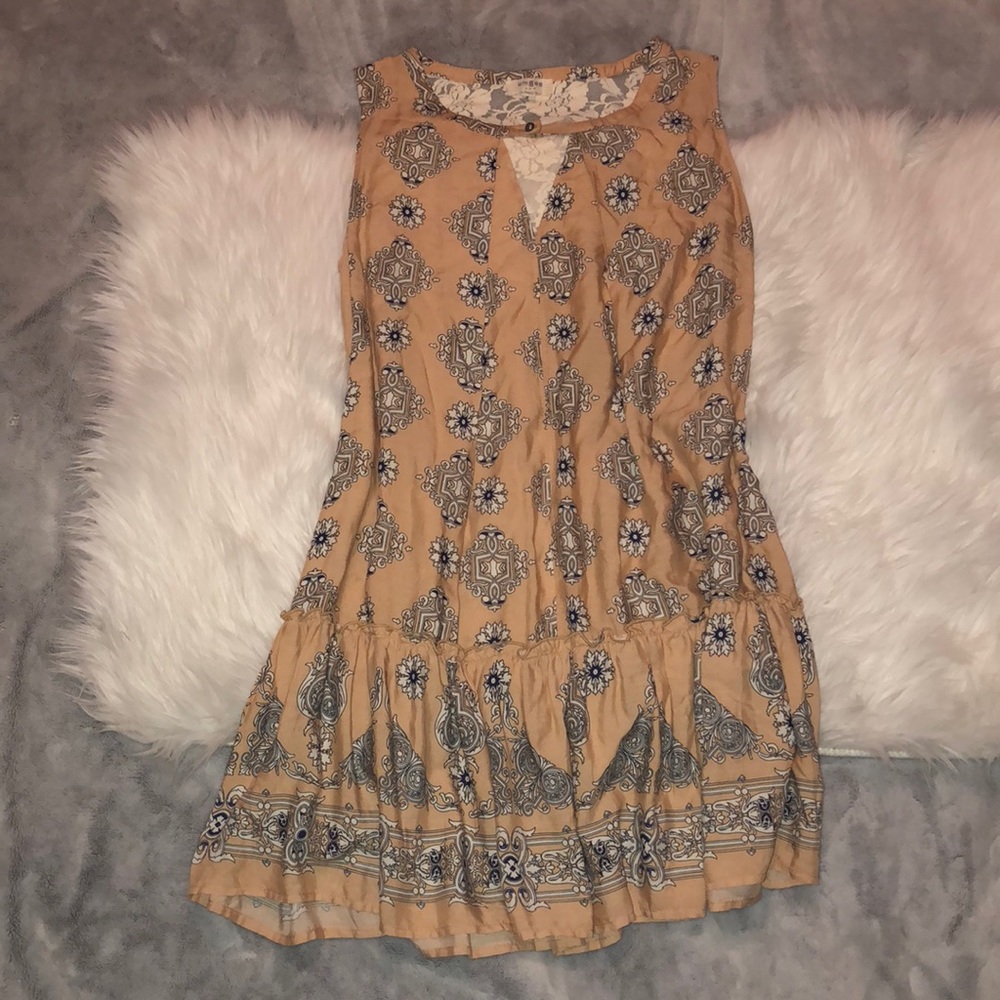 **SOLD** Omgee Flowy dress